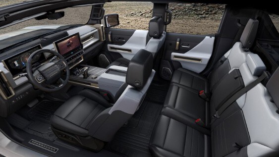 gmc_hummer_ev_luxury_interior_black_gold_and_white.jpeg