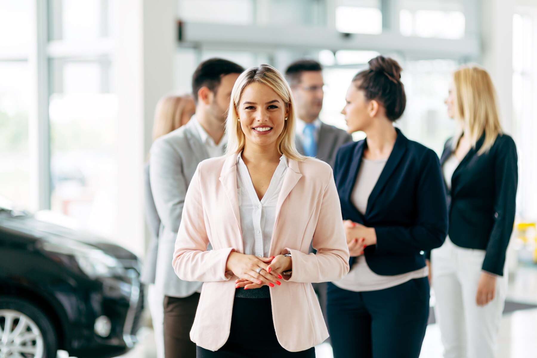 Len Stoler Ford is a Ford Dealership in Owings Mills near Randallstown MD | sales agent smiling