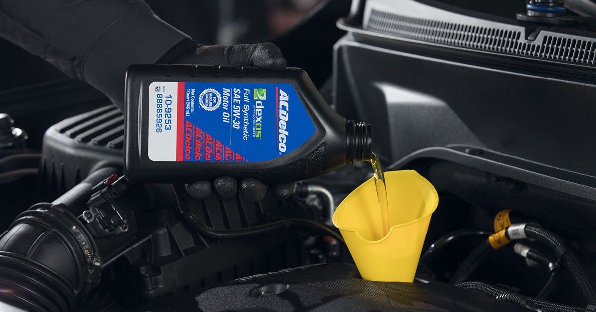 Certified technician working on a Premium Oil Change