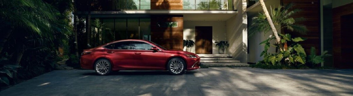 red lexus es side passenger view