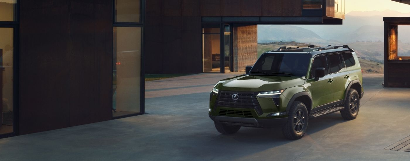 A green 2025 Lexus GX from the front.