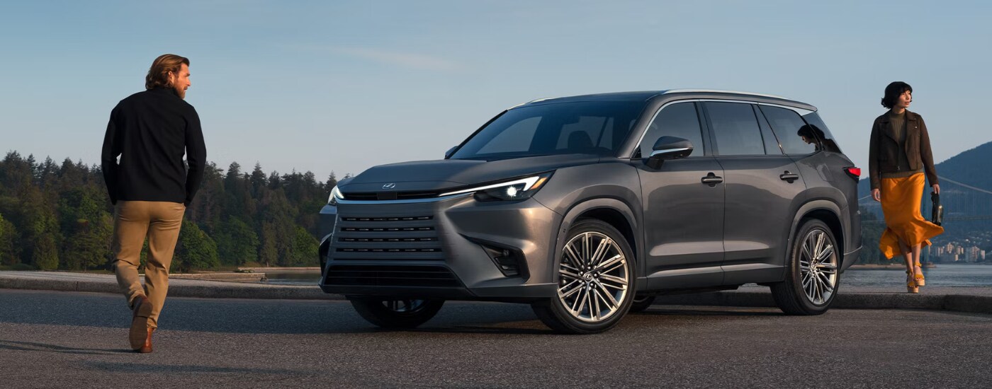 2026%20Lexus%20GX%20-%20people.png Two people walking up to their blue 2026 Lexus TX