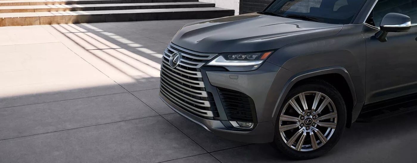 Close-up on the front of a grey 2023 Lexus LX.