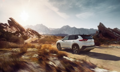Nissan Rogue Nissan Rogue driving in sand
