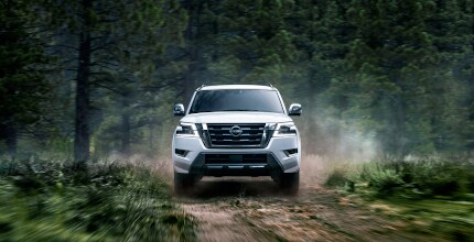Nissan Armada Nissan Armada driving in forest