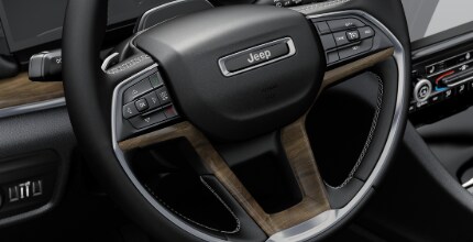 Jeep Grand Cherokee L interior interior shot of steering wheel inside the Jeep Grand Cherokee L