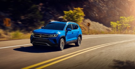 VW Taos blue VW Taos driving