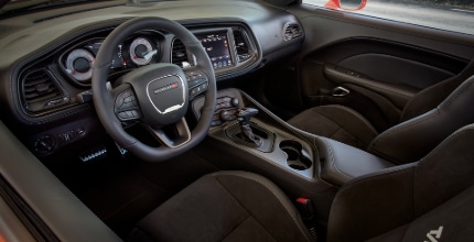 Dodge Challenger interior interior of a Dodge Challenger showing front two seats and dashboard
