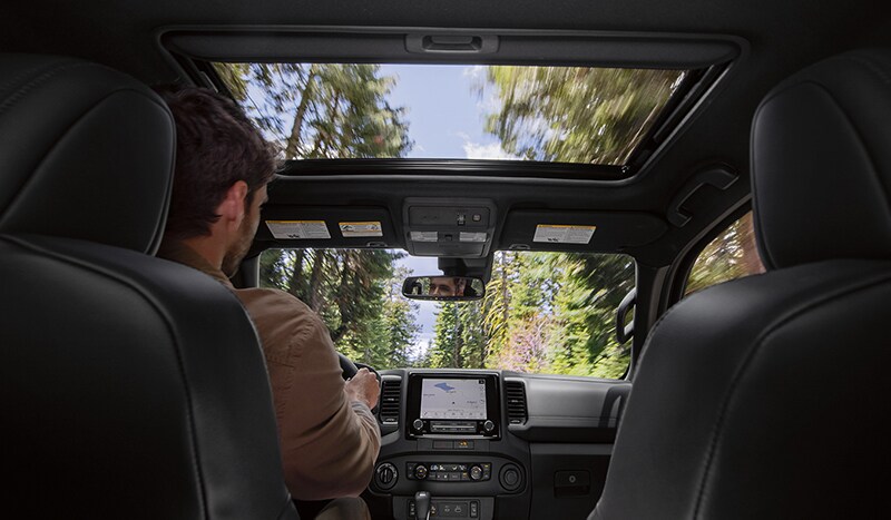 All-New 2022 Nissan Frontier photo view of interior front from the back seat. All-New 2022 Nissan Frontier, Mesa AZ