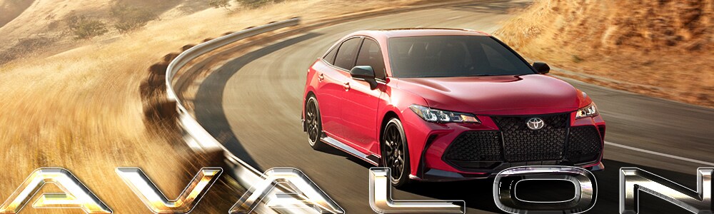 2019 Toyota Avalon to Buy or Lease in Spokane Red 2019 Toyota Avalon driving in the country through wheat fields