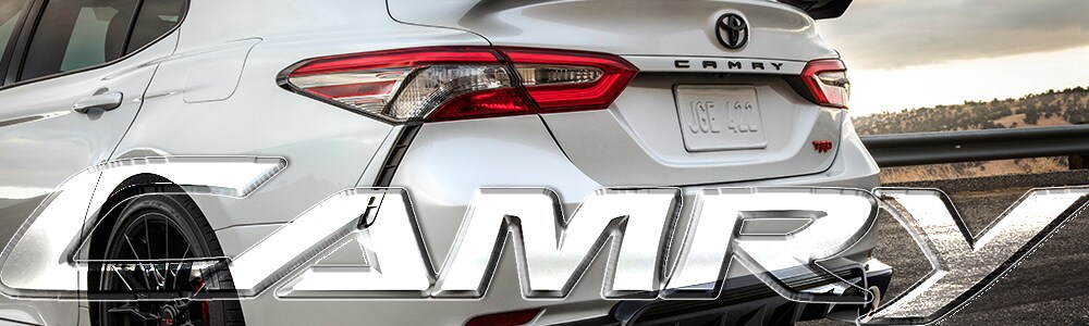 2019 Toyota Camry to Buy or Lease in Spokane Rear View of a white 2019 Toyota Camry with Black trim
