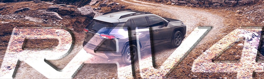 2018 Toyota Rav4 to Buy or Lease in Spokane A new gray 2018 Toyota Rav4 driving on a gravel road