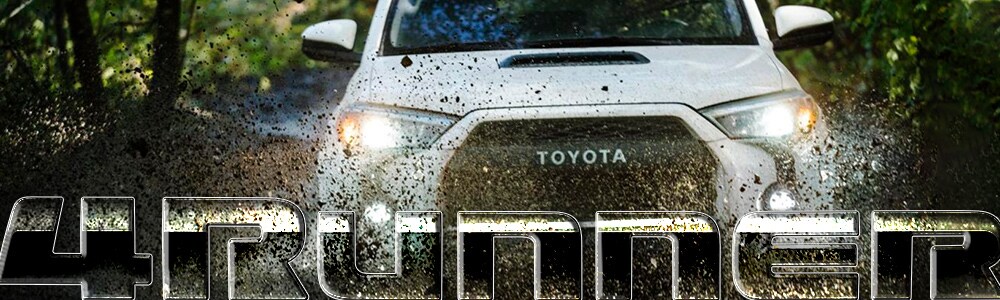2018 Toyota 4Runner to Buy or Lease in Spokane A new, white 2018 Toyota Front View with Headlights going through a mud pit