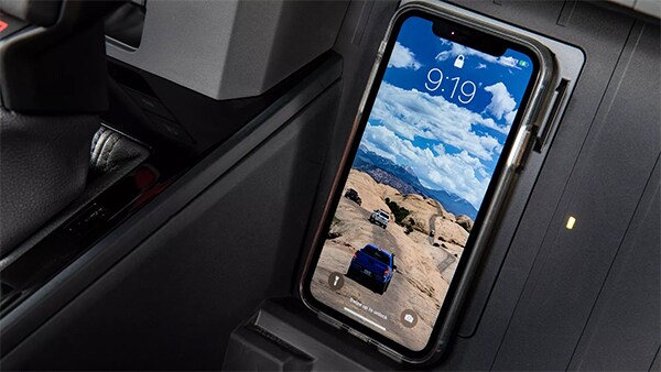 Early Interior Images released of the All-new 2022 Toyota Tundra - wireless phone charger shown.