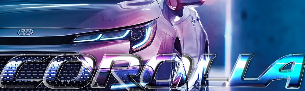 New 2018 Toyota Corolla for Sale & Lease in Spokane Closeup of a silver New 2019 Toyota Corolla under blue and pink neon lights