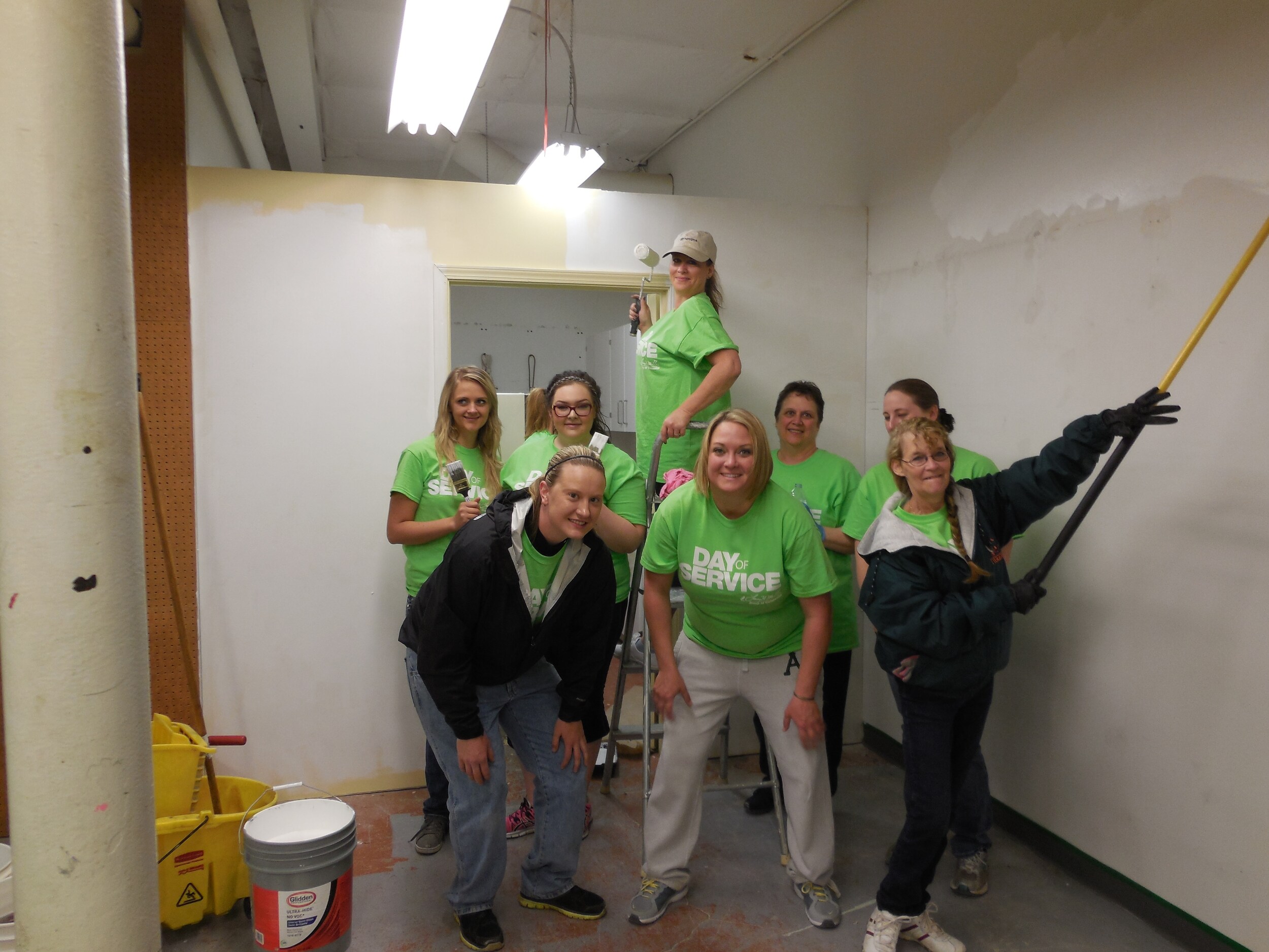 LHM Toyota Spokane staff help paint and move boxes