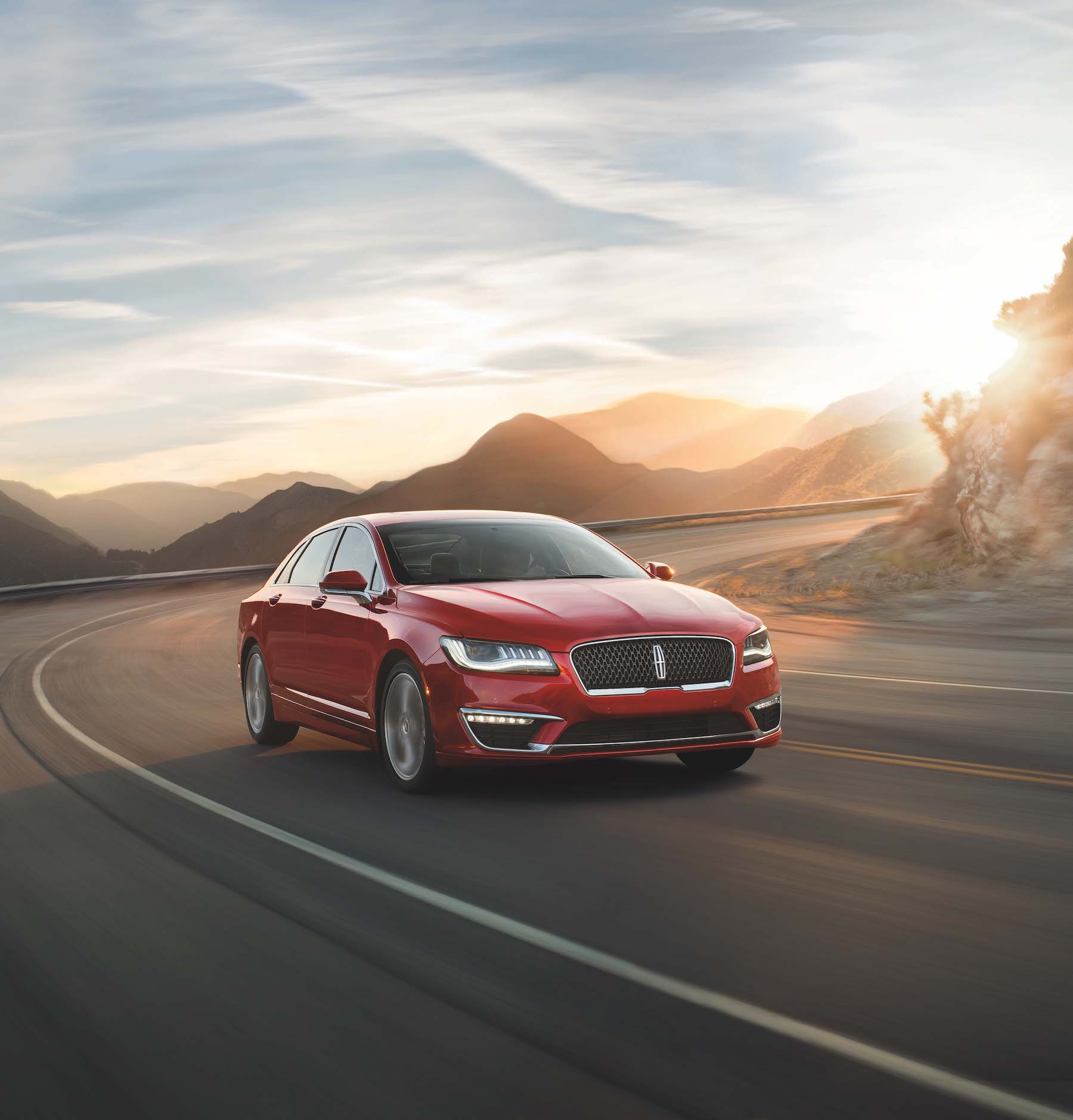 How to get the best deal when buying a car at Lincoln of New Bern | Red lincoln driving on street