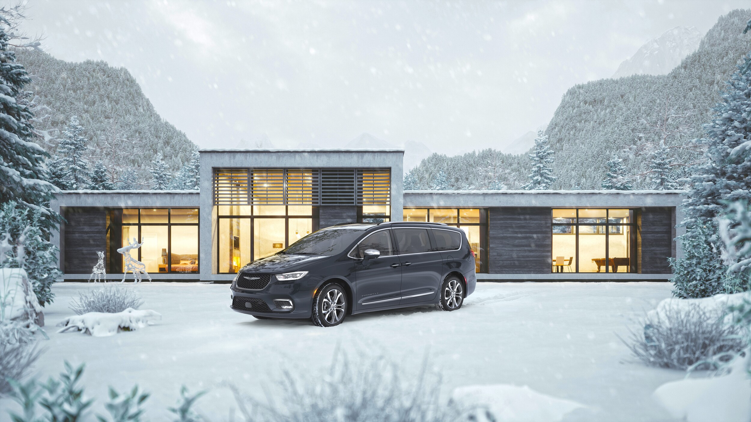 2023-Chrysler-Pacifica-Pinnacle-Van-L02.jpg Chrysler Pacifica minivan parked in front of a modern home, covered in snow.