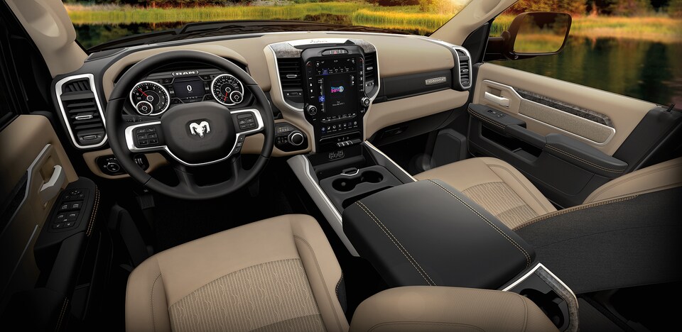 2021-RAM-3500-BigHorn-Lonestar-CrewCab-Truck-I02.png black and tan Ram 3500 truck interior and driving console area