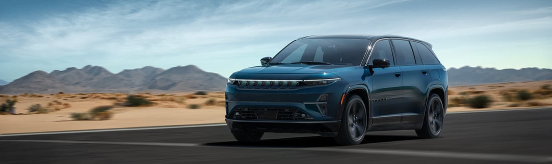 2025-Jeep-WagoneerS-LaunchEdition-SUV-L01.png new Jeep Wagoneer S driving on a desert road