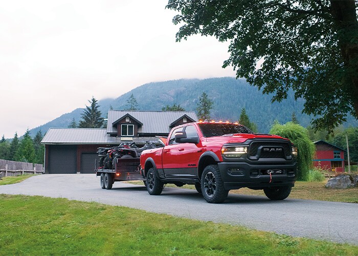 red Ram 2500 heavy-duty truck towing a trailer