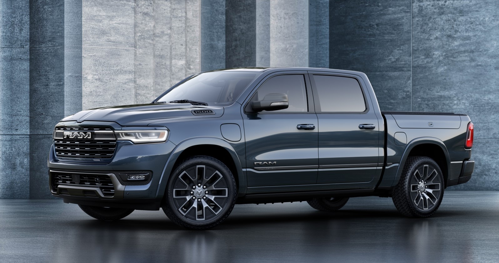 2025 1500 RamCharger Tungsten in Blue.jpg blue Ram 1500 RamCharger parked on a showroom floor