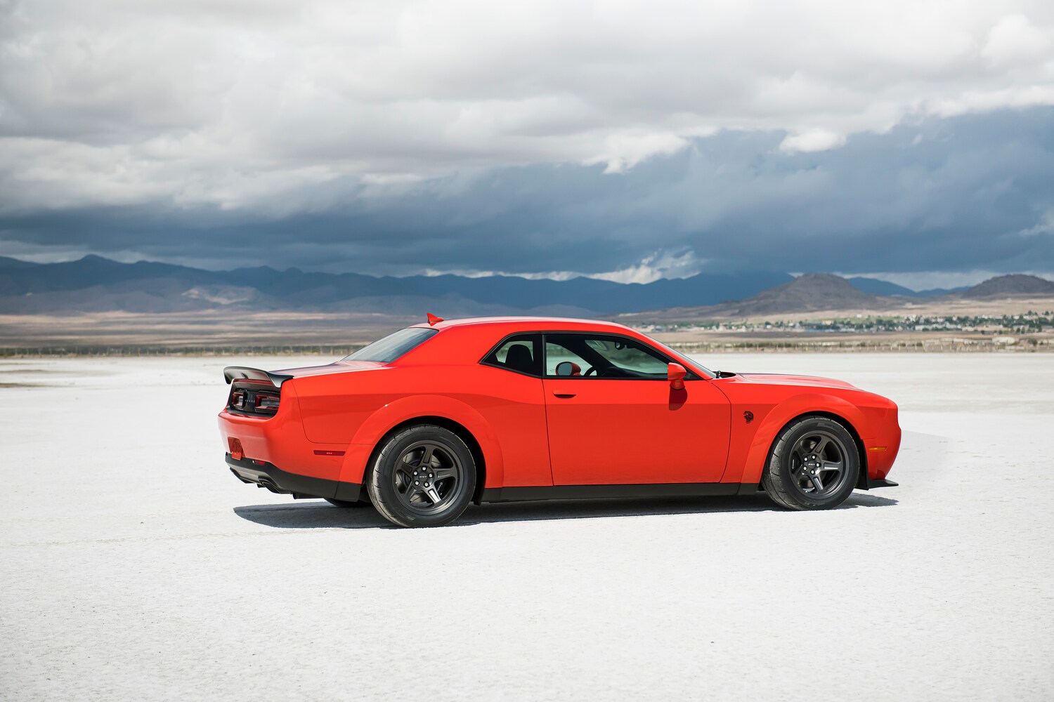2021-Dodge-Challenger-SRTRedEye-Sedan-L09.png red Dodge Challenger parked on white desert sand