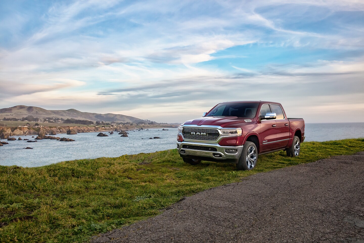 red Ram 1500 parked next to an ocean outlet