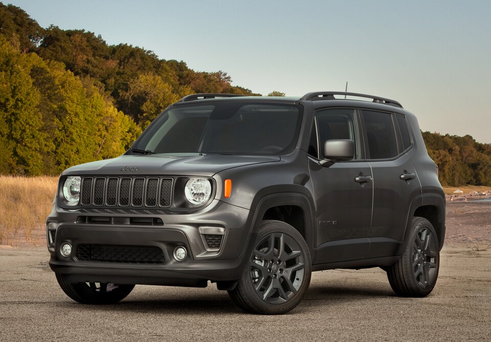 2021-Jeep-Renegade-80thAnniversary-SUV-L01.jpeg gray Jeep Renegade parked on a beach