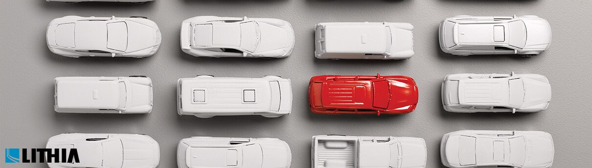 Does Your Car Have a Recall? Red Car standing out in a group of gray cars