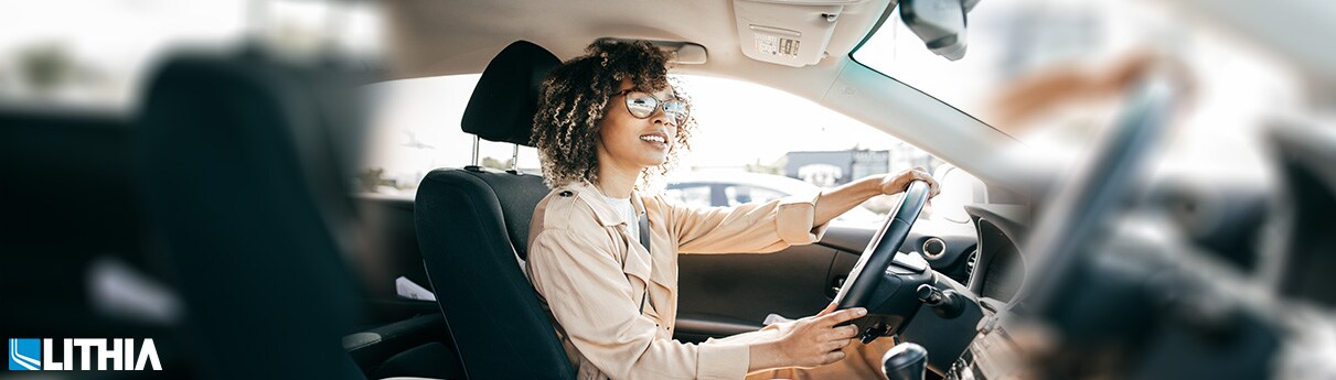 What are the Best Car Warranty Plans Female driving a car