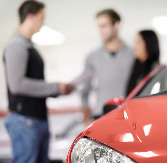 Couple buying a car