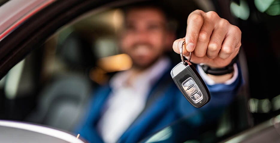 What to do when your lease ends. Customer handing over keys returning a lease vehicle.
