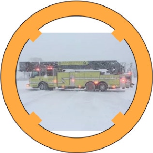 AutoSock installed on a Purcellville Volunteer Fire Company ladder firetruck