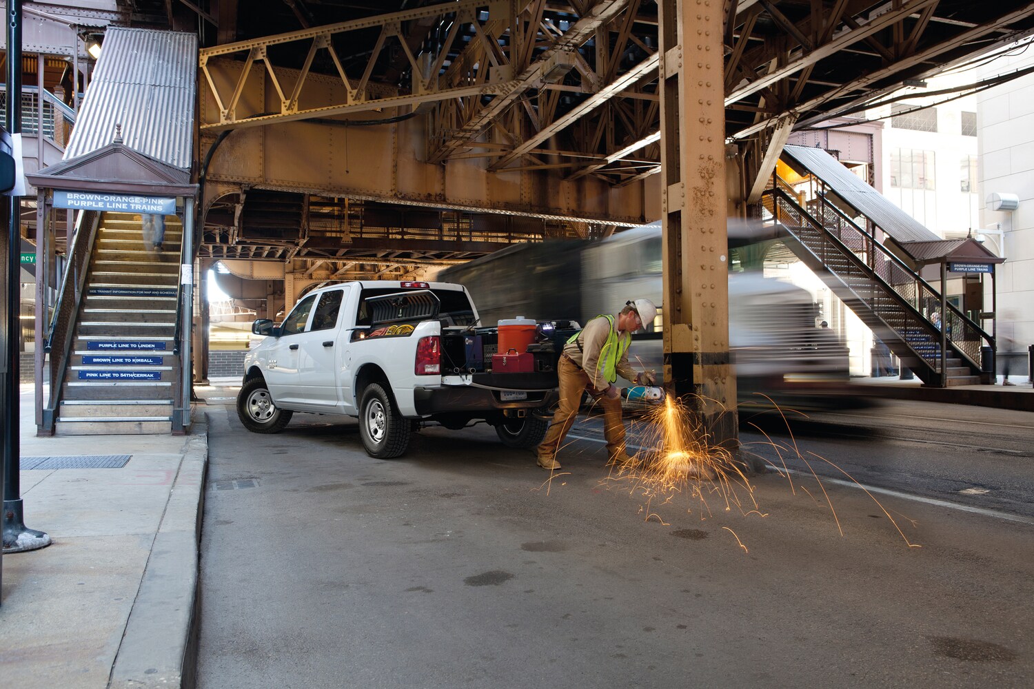 2021-RAM-1500-Classic-Tradesman-CrewCab-Truck-L01.png white Ram 1500 Classic truck parked at an underpass under construction