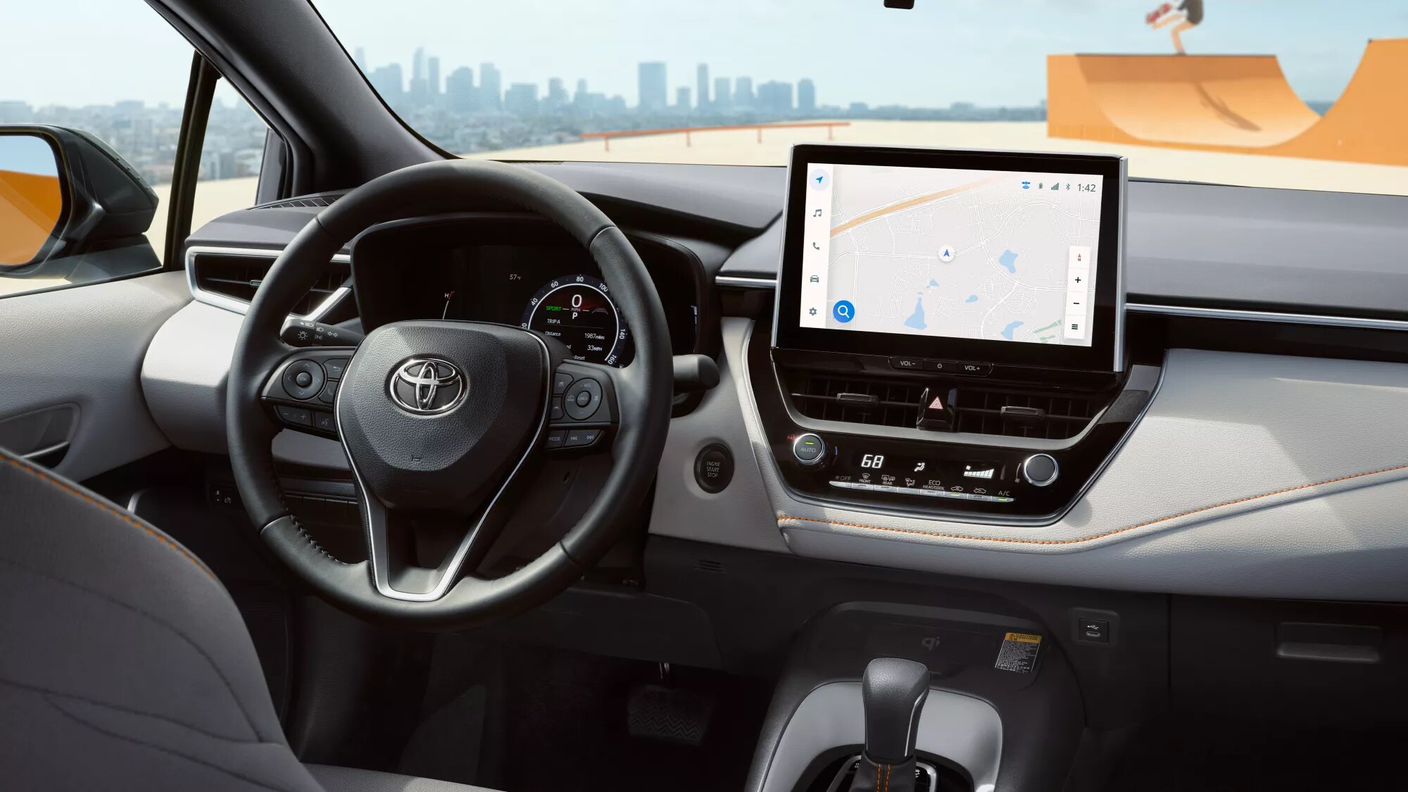 grey Toyota Corolla interior, steering, dash, and windshield