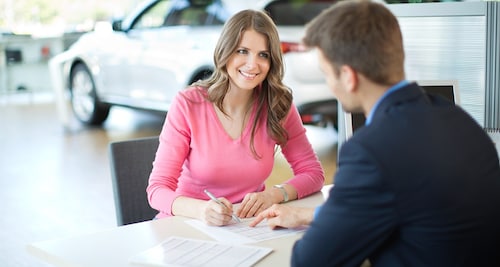 Finance signing paperwork.png