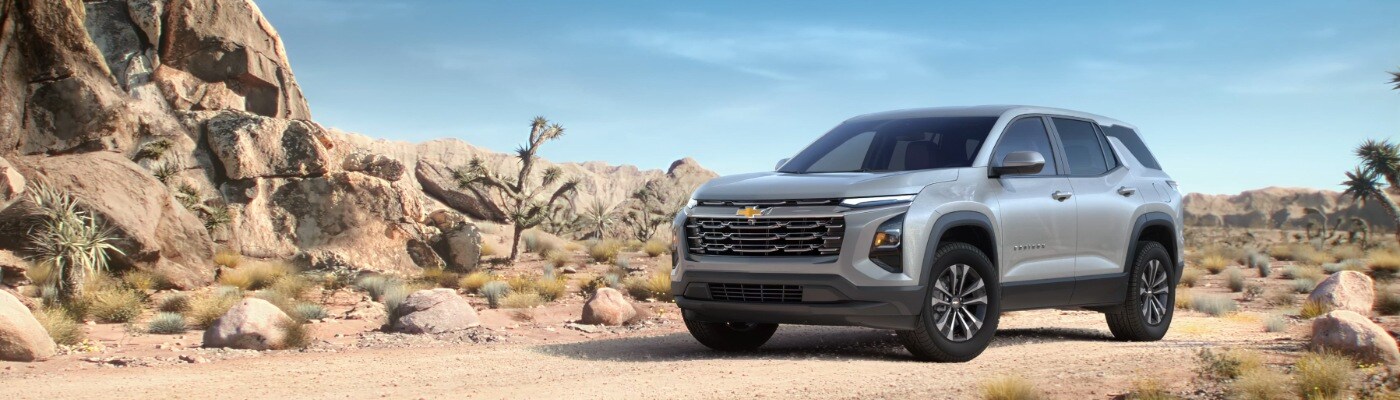 2025 Chevy Equinox A Gray 2025 Chevrolet Equinox parked in rocky terrain