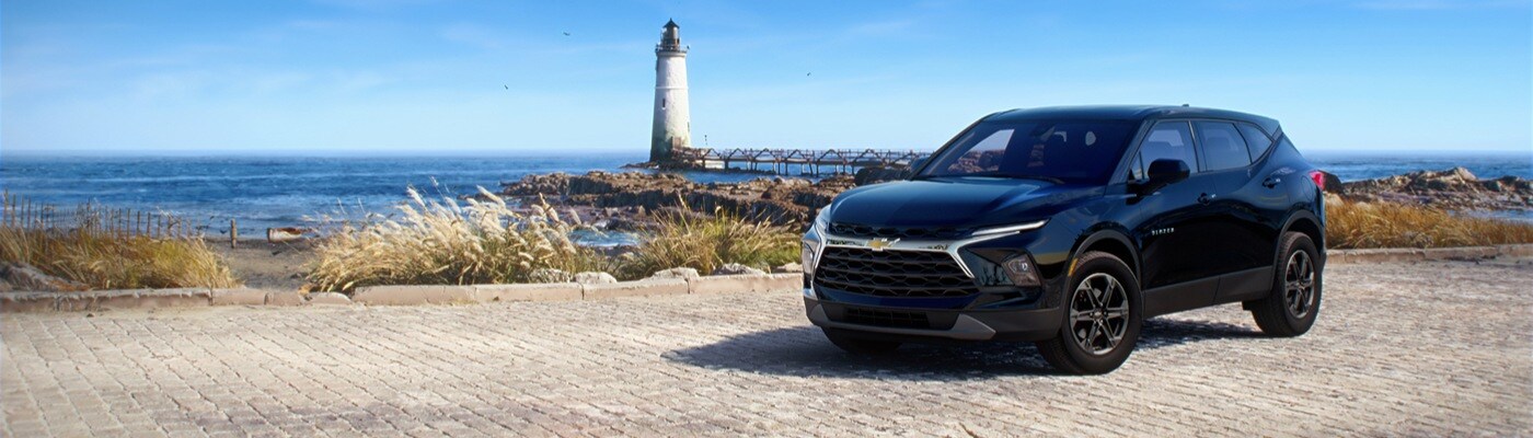 2025 Chevy Blazer Black 2025 Chevrolet Blazer parked near a lighthouse