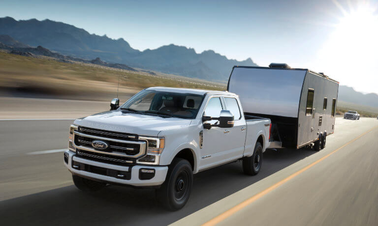 2022 Ford F-250 Exterior Towing Camper On Highway