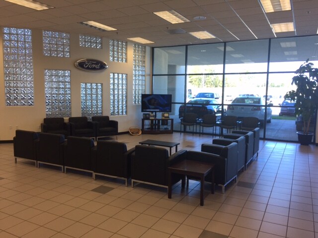 A waiting room with chairs