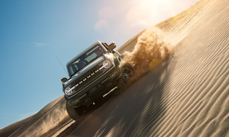 2023 Ford Bronco Extereior Driving Through Sand Dunes