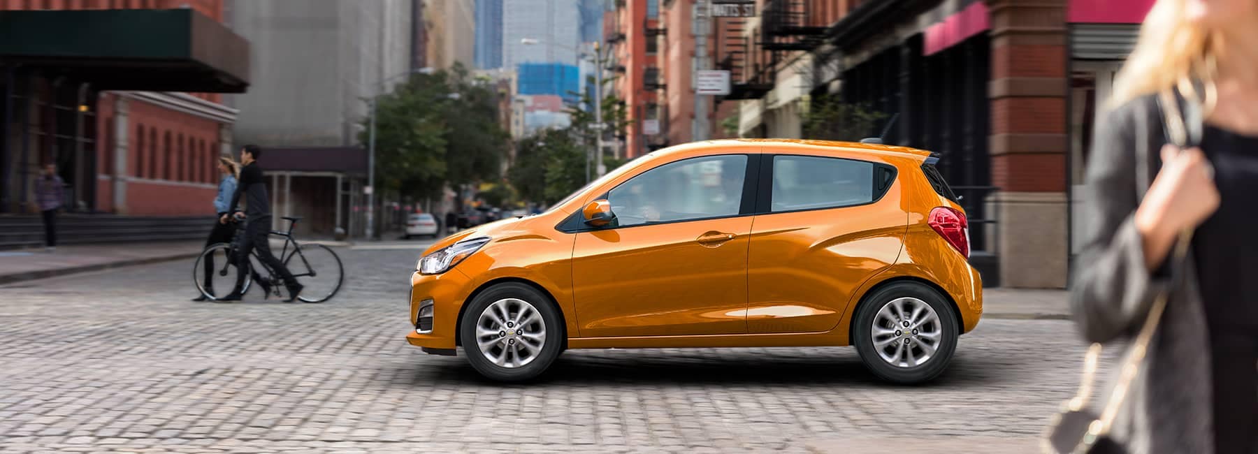 Orange-2020-Chevrolet-Spark-on-a-City-Street.jpg