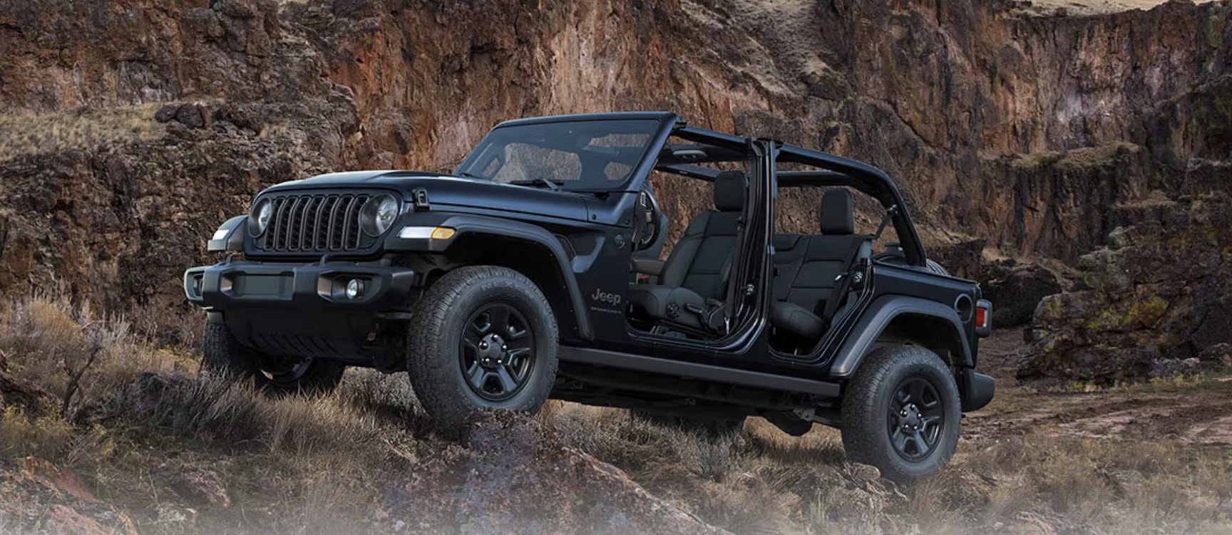 2026 Jeep Wrangler rear cargo area with the seats folded flat