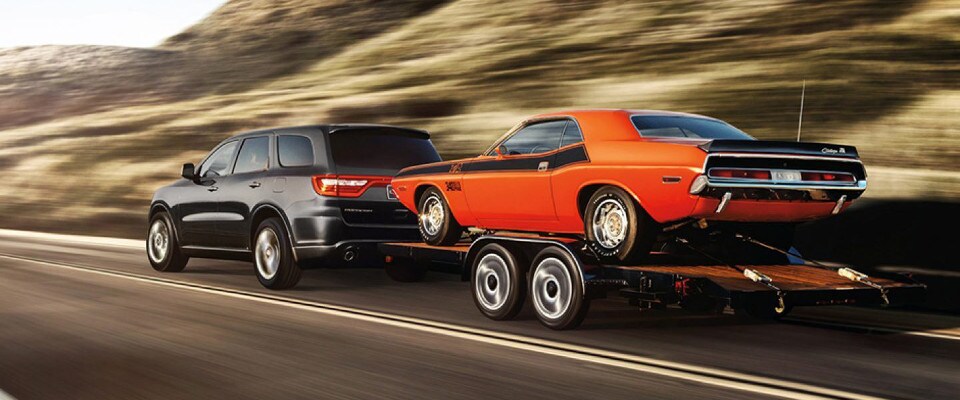 2018 Dodge Durango towing a car