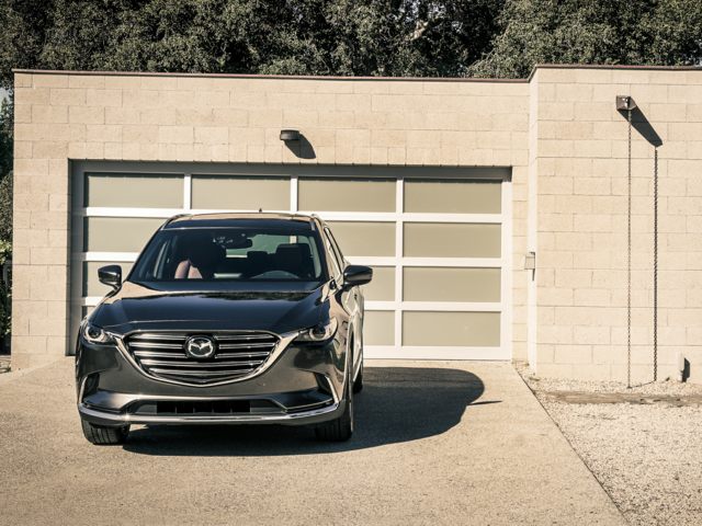 2018 Mazda CX-9 Touring front view parked in front of garage.jpg