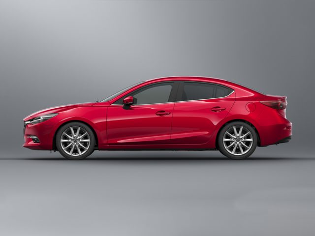 2018 Mazda3 Touring sedan red facing left grey background.jpg