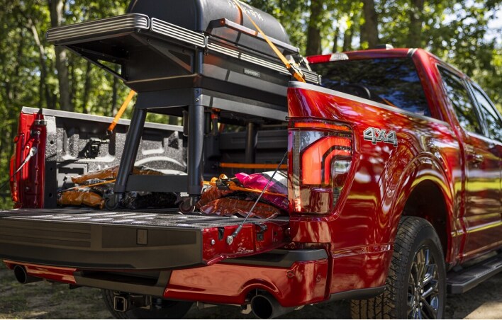 Red Truck carrying a grill