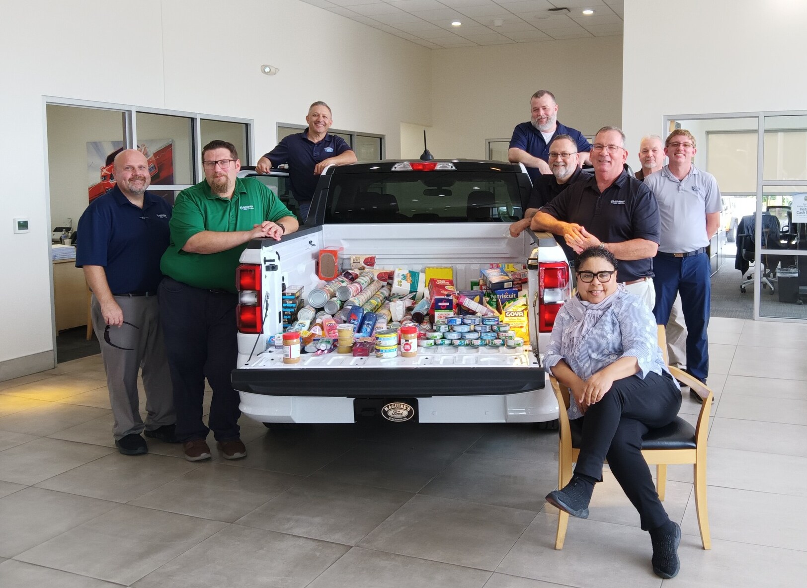 Team gathered around food drive