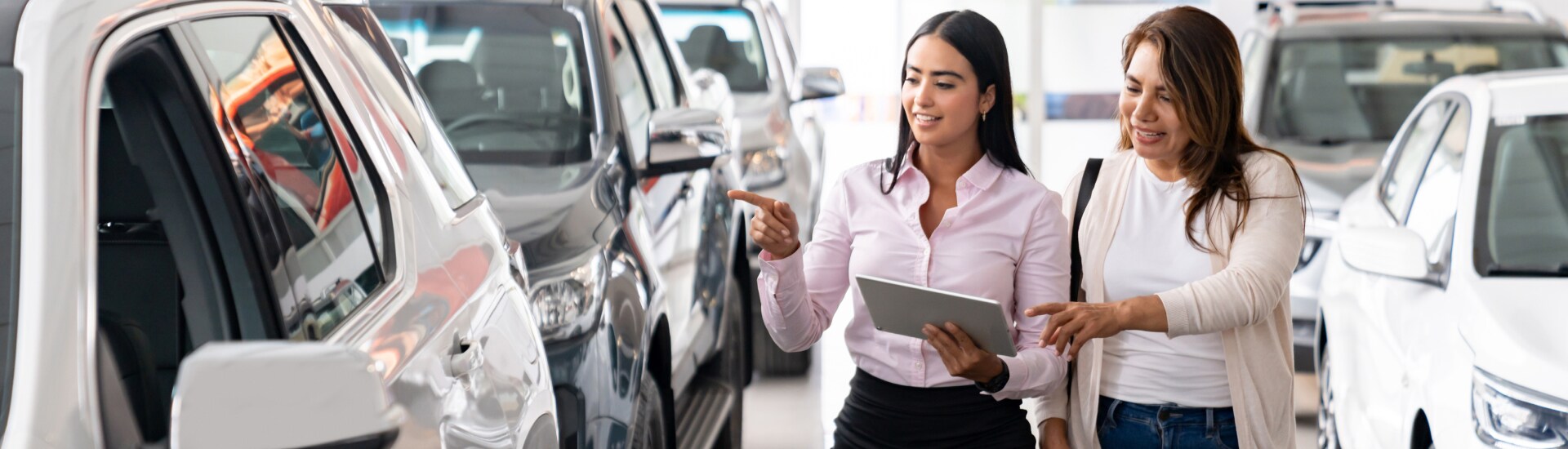 Maguire's Sales Specialist showing potential vehicles